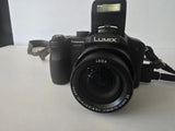 Panasonic DMC-FZ7 6MP Digital Camera with battery. needs a charger. tested works