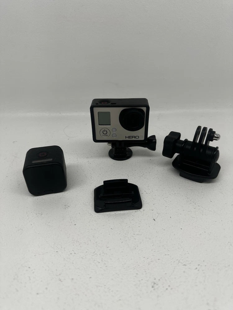 Black action camera bundle with two cameras and multiple mounting accessories
