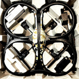 Black foam storage case for quadcopter, with four propeller compartments