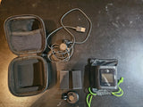 Action camera kit with waterproof housing, pouch, cables, and mount