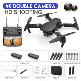 Dual-camera quadcopter drone with four rotors, dark gray body
