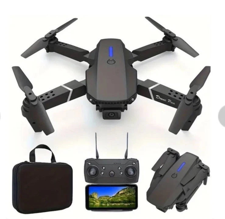 Quadcopter drone with remote controller, screen, and carrying case