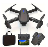 Quadcopter drone with remote controller, screen, and carrying case