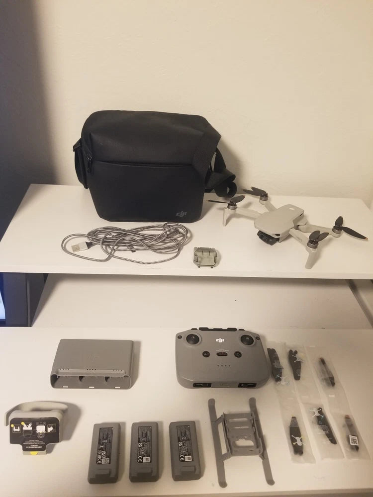 DJI Mini 2 Fly More Vlogger Combo kit with drone, controller, batteries, props, case