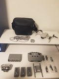 DJI Mini 2 Fly More Vlogger Combo kit with drone, controller, batteries, props, case