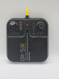 Dark gray drone video controller with antenna, thumbsticks, and labeled DX-5 front