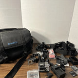 Black GoPro Hero 3 action camera kit with waterproof case, mounts, and accessories