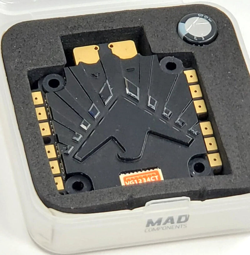 RC drone motor controller module in foam case, black PCB with knob and white brand label