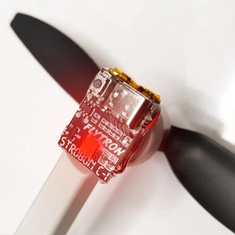 Red rechargeable LED drone light with CREE lens and exposed circuit board