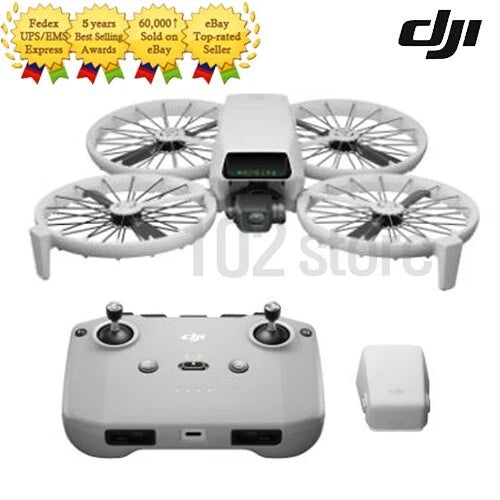 White foldable quadcopter drone with controller and spare battery, compact design