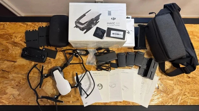 DJI Mavic Air drone kit with remote, batteries, prop guards and carrying case