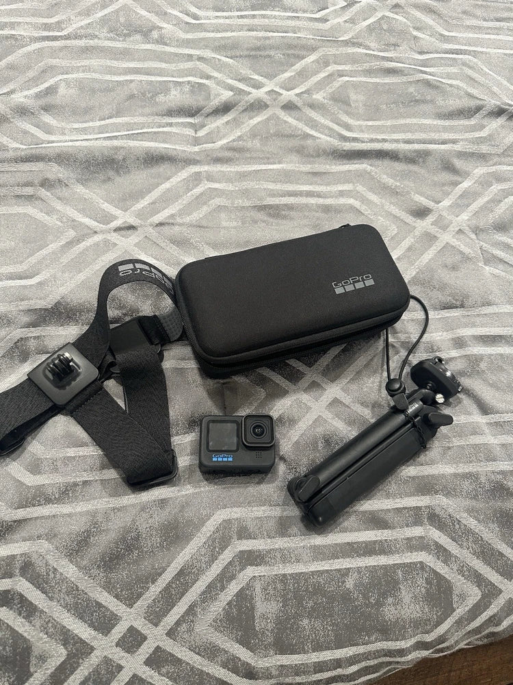 GoPro Hero10 black action camera with protective case and mounting accessories
