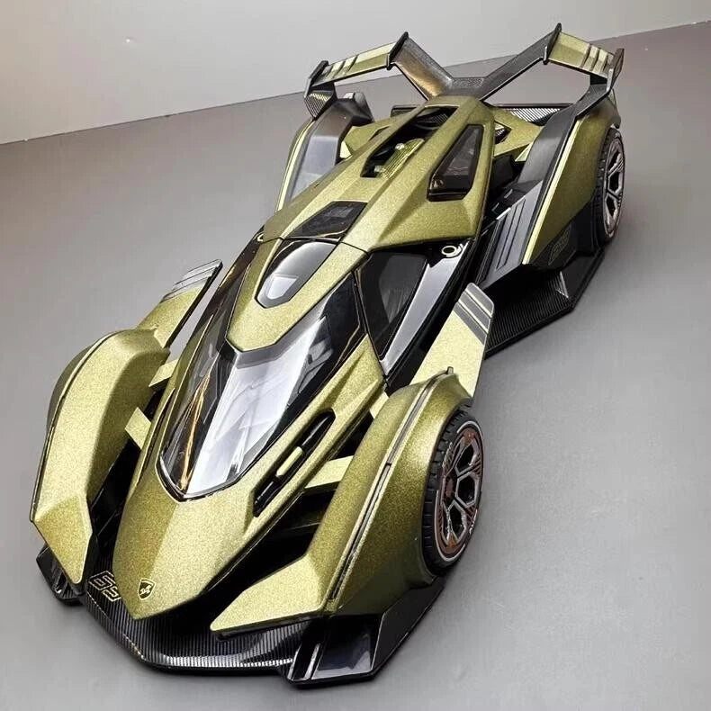 Lamborghini Vision GT alloy car model, gold and black, front 3/4 view, 1:24 scale