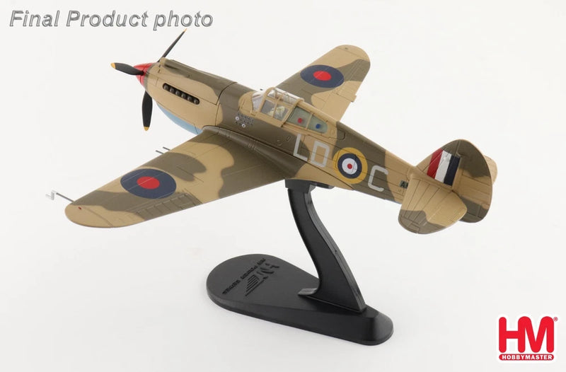 1/48 scale model airplane on black display stand, tan and camouflage with roundels
