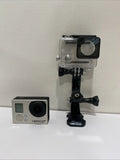 GoPro HERO3 Plus silver action camera in clear waterproof housing with black mount