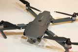 Dji Mavic Pro drone with propeller guards, front camera and folded arms