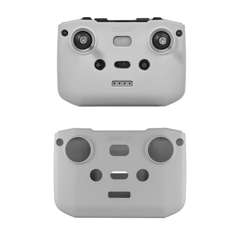 Light gray silicone remote controller cover with cutouts for sticks and buttons