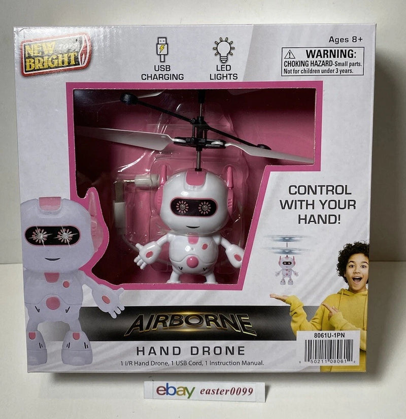 Astronaut hand-controlled flyer drone toy set, boxed with white astronaut figure and quadcopter