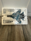 1:72 scale Su-30SM fighter jet model, blue and gray, in display box
