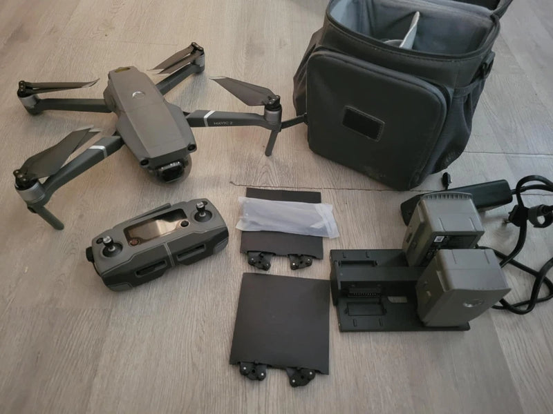 Foldable quadcopter drone with controller, batteries, and carrying case set