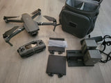 Foldable quadcopter drone with controller, batteries, and carrying case set