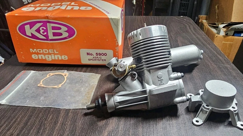 RC model engine with finned cylinder, carb and intake, silver metal hardware