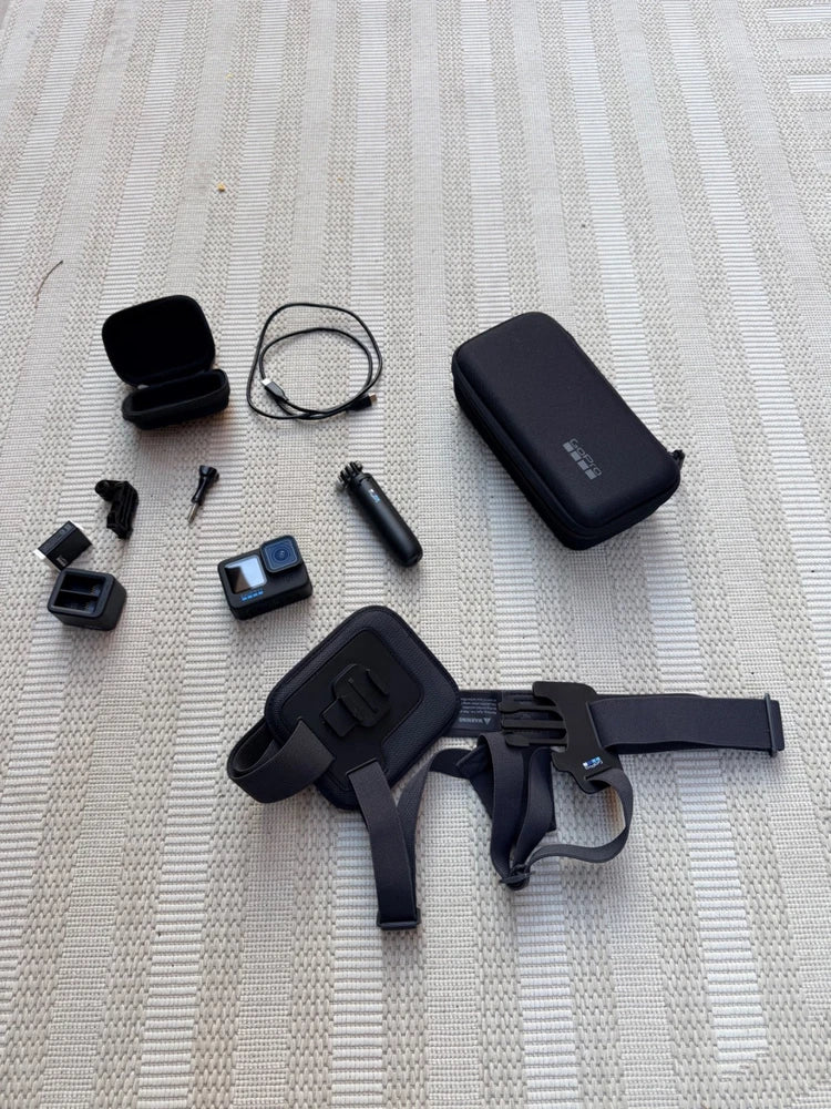 GoPro HERO11 Black action camera with protective case and mounting accessories