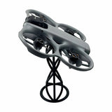 Desktop drone display stand with black spring base and gray drone holder ring