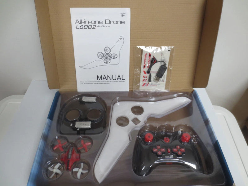 All-in-one drone kit with remote controller and quadcopter in plastic packaging