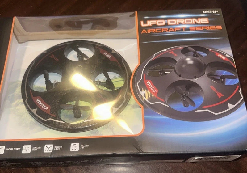 UFO drone joystick controller retail packaging with circular controller graphics