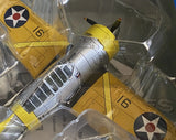 Yellow and gray model aircraft with national insignia, mounted in clear blister packaging