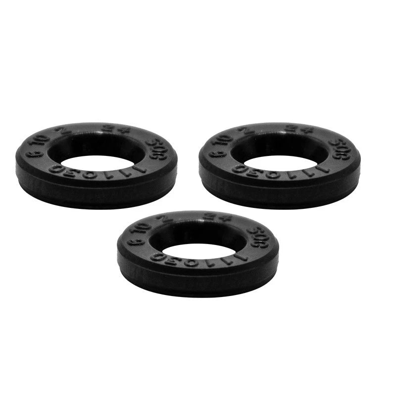 Set of black rubber oil seals with circular center holes