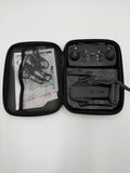 Foldable FPV quadcopter drone and remote controller in open carrying case