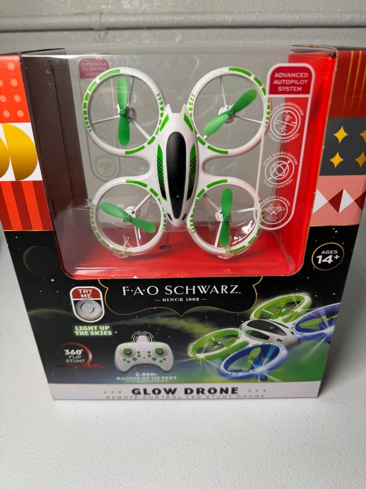 Glow mini stunt drone in retail box with green accents and light-up prop guards