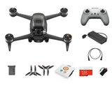 DJI FPV drone bundle with quadcopter, controller, batteries, cables and adapter