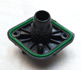 Battery cooling pipe adaptor with black plastic fitting and green seal ring