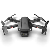 Dark gray folding quadcopter drone with dual camera module and four propellers