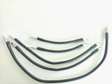 Battery cable set with four black 4-gauge curved cables and metal terminals