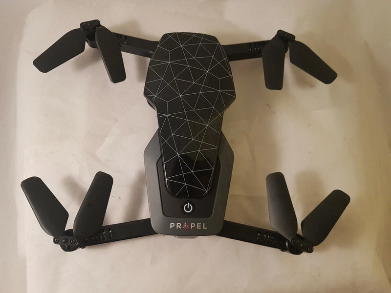 Folding RC drone body, dark gray, with four propeller arms for parts