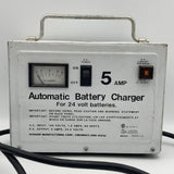 Vintage automatic battery charger with handle, amp meter, and ON/off switches, 5 amp