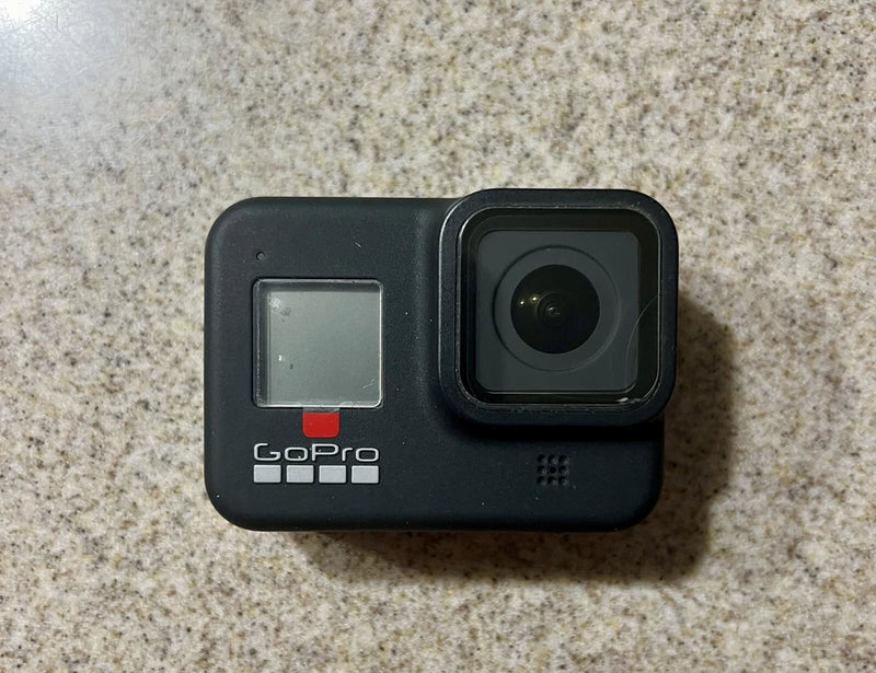 GoPro action camera front view, black housing with lens and small status screen