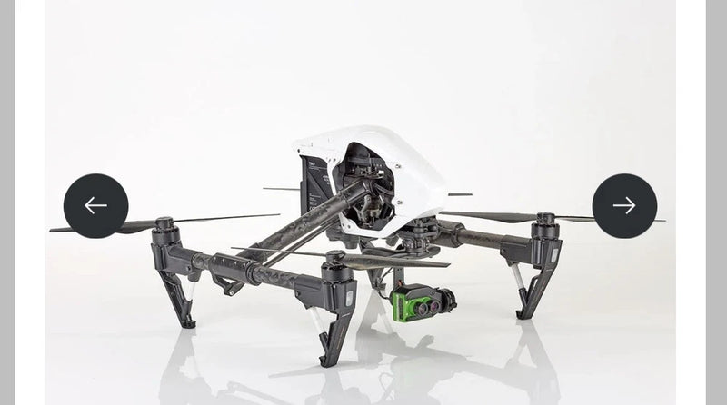 Drone with gimbal camera and quadcopter frame, black and gray with white body