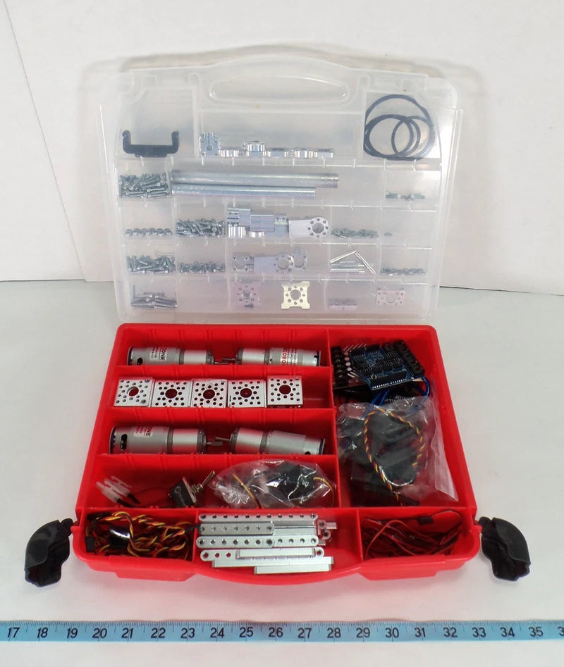 Drone parts lot in red storage case with PCB boards, motor parts, and screws