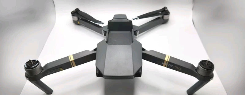 DJI Mavic Pro drone body with four arms and propellers, dark gray