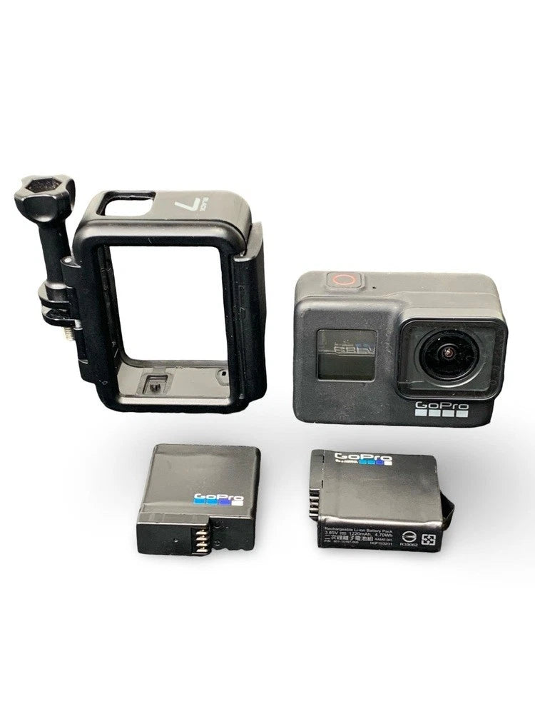 GoPro HERO7 action camera kit with mount bracket and extra batteries