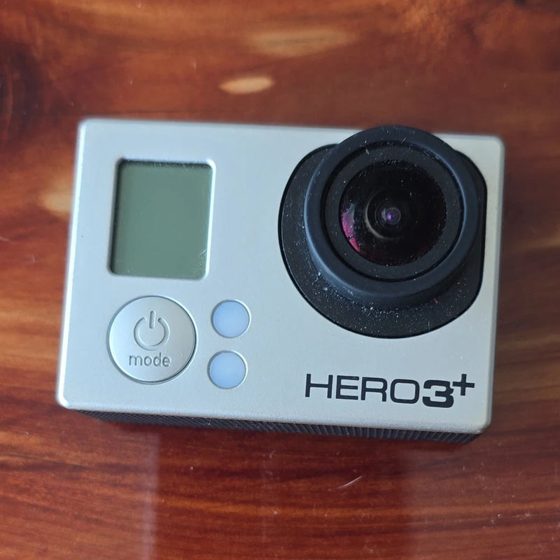 GoPro HERO3+ action camera in silver with front lens and mode button panel