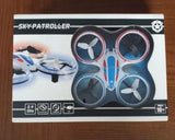 Mini RC toy drone in blue and white with four propellers and LED lights