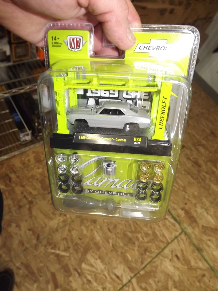 1969 Chevrolet Camaro model kit in clear blister with neon green backing, R84 label