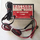 Battery charger with red and black leads and label, 6V/12V 1A output