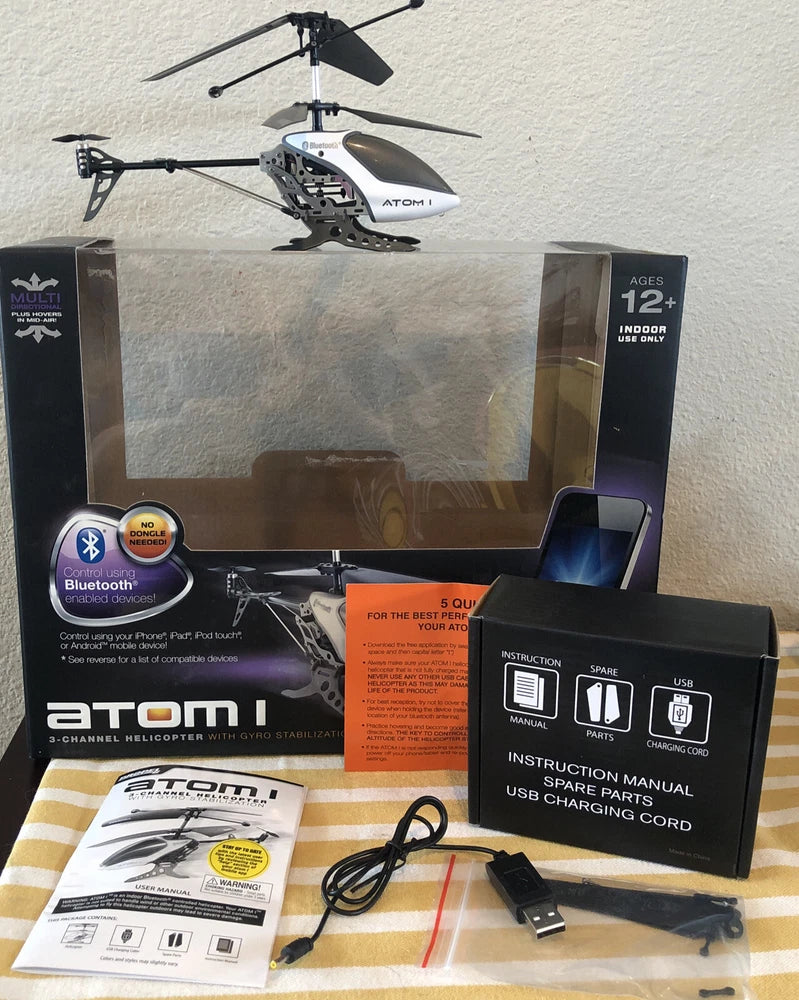 3-channel RC helicopter with gyro stabilization, Bluetooth, and charging accessories